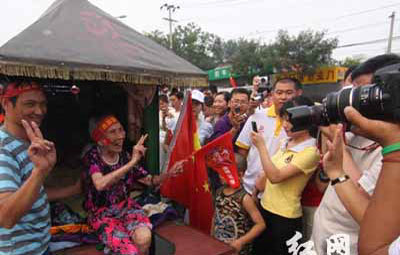 Grandson Peddles 98-Year Old Grandmother To Games