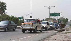 This Cabbie Has Use For Only One Gear - Reverse