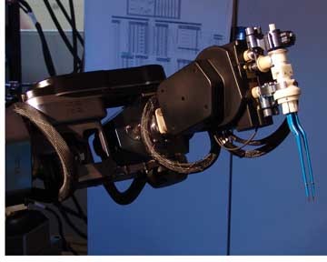 Robotic Arm Performs Brain Surgery