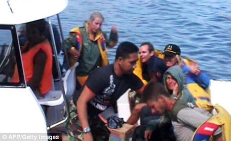 Scuba Divers Survive Shark-Infested Waters and Komodo Dragon